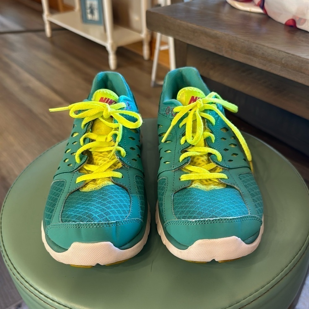 Nike running shoes, aqua blue, yellow, white size 9.5